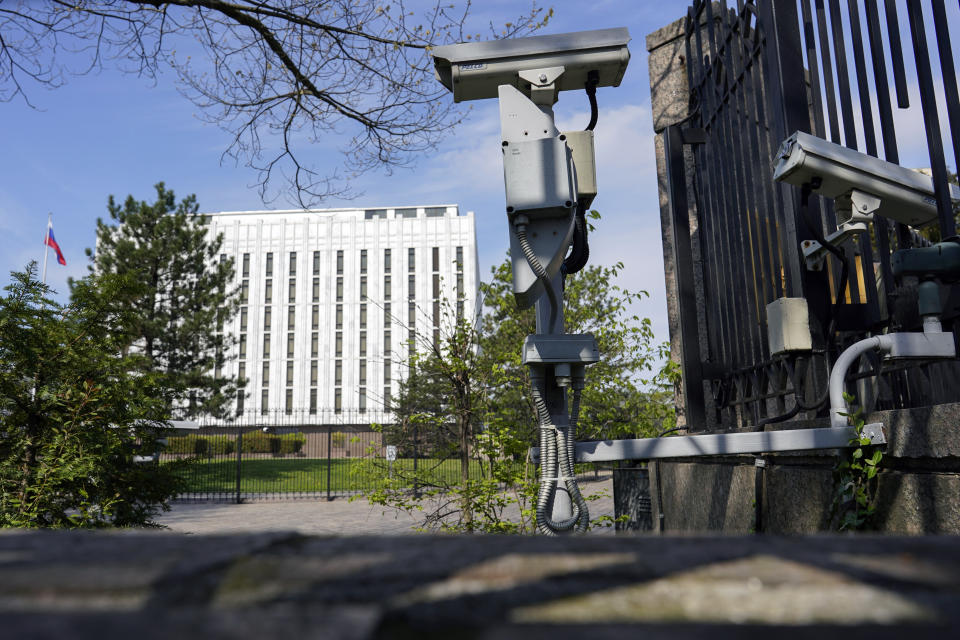 Security cameras are seen on the grounds of the Embassy of the Russian Federation in Washington, Thursday, April 15, 2021. The Biden administration has rolled out a sweeping set of sanctions on Russia over its election interference, hacking efforts and other malign activity. (AP Photo/Carolyn Kaster)