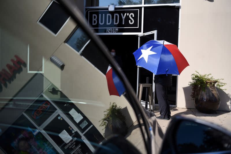 FILE PHOTO: Voters line up at a polling station on Election Day in Houston