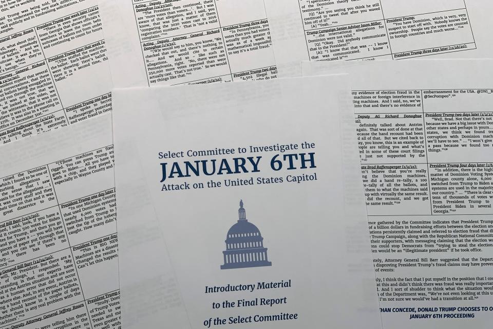 Pages of the executive summary from the House select committee investigating the Jan. 6 attack on the U.S. Capitol, are photographed Monday, Dec. 19, 2022, in Washington.