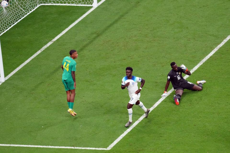 Saka celebrates his third goal of the tournament (PA)