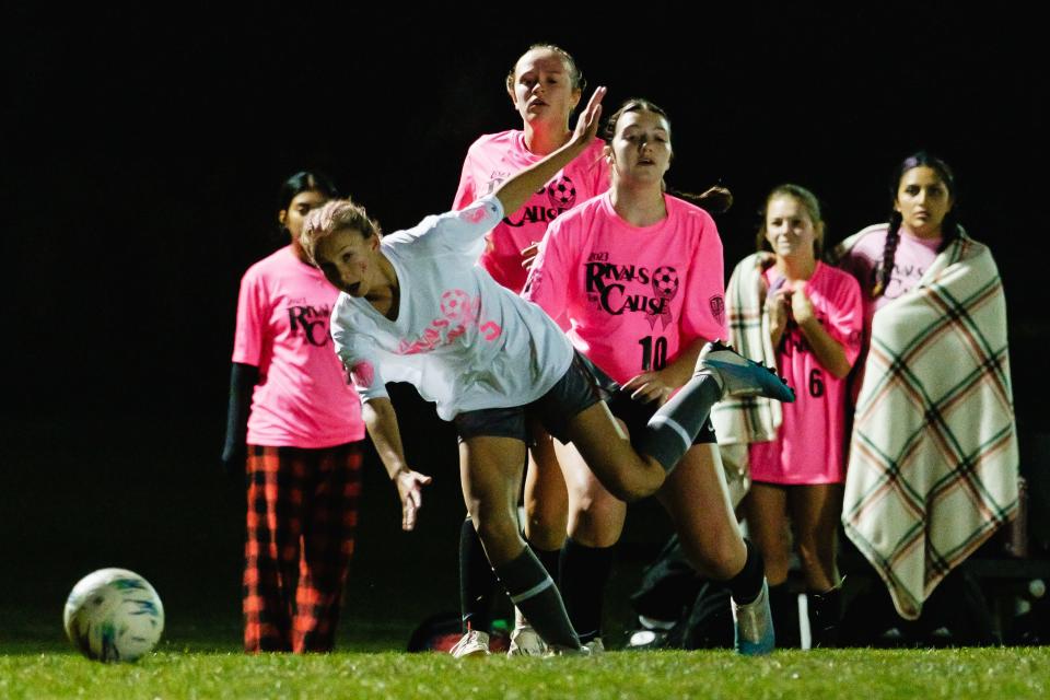 Dover's Miley Patton follows through on a shot on goal against New Philadelphia, Wednesday, Oct. 11 at Southside Community Park Soccer Complex in New Philadelphia.