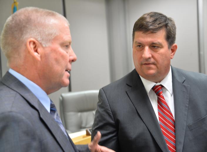 David T. Sovine, right, who takes over as Washington County Public Schools superintendent on July 1, listens to Superintendent Boyd Michael on Wednesday afternoon after it was announced Sovine would be the next superintendent. Michael is retiring. His last day is June 30.