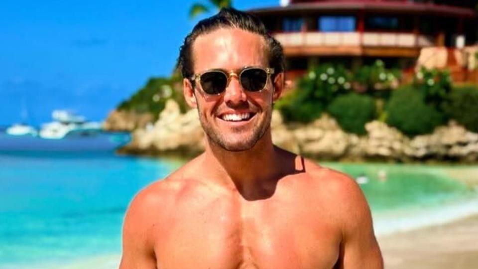 Spencer Matthews shirtless and tanned on beach in St Barts displaying six pack abs 