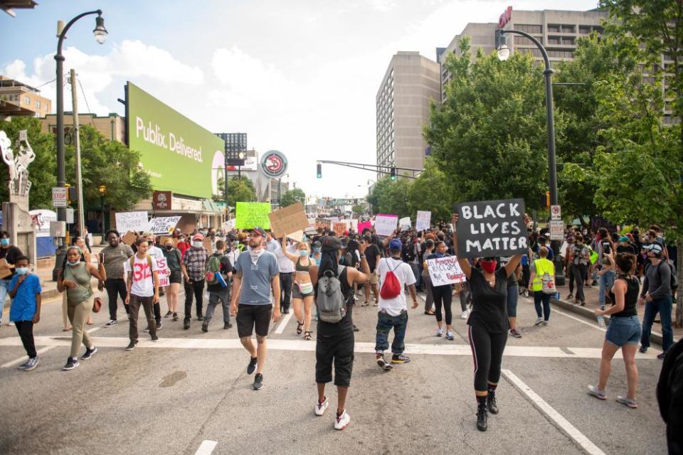 Peaceful protesters take the streets of Atlanta on 4 June.