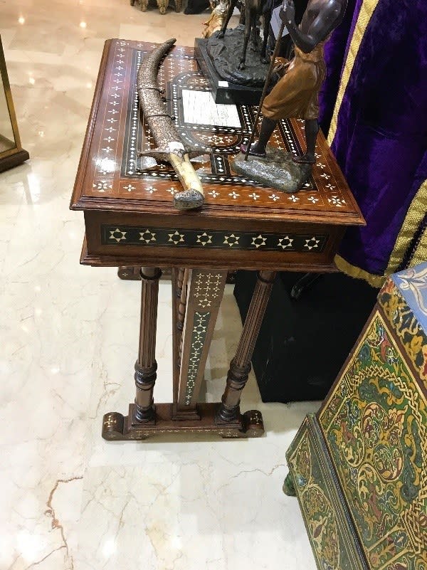 A beautiful inlaid table with a traditional Moroccan chest and some eclectic pieces sourced for tourists. We went to this shop in Tangier when it first opened, and when we returned a couple of months later, we learned it had already closed!