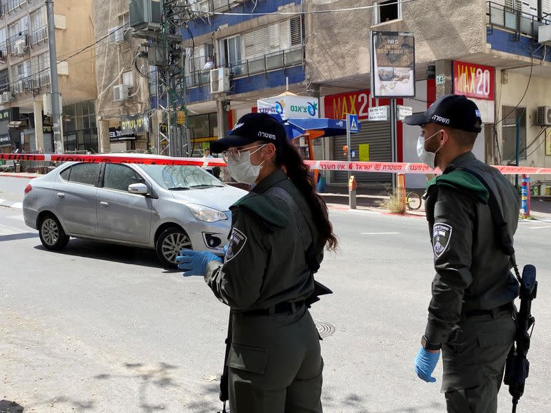 Israeli police stand guard at the entrance to the town of Bnei Brak as they enforce a lockdown of the ultra-Orthodox Jewish town badly affected by coronavirus disease (COVID-19), Bnei Brak