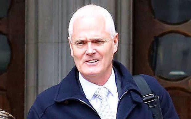 Darren Cavanaugh leaving the High Court in London