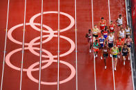 <p>Runners compete in round one of the Men's 1500m heats on day eleven of the Tokyo 2020 Olympic Games at Olympic Stadium on August 03, 2021 in Tokyo, Japan. (Photo by Richard Heathcote/Getty Images)</p> 