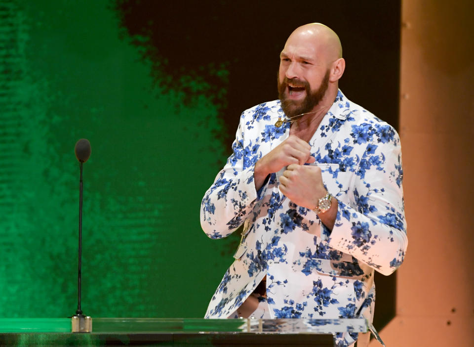 LAS VEGAS, NEVADA - OCTOBER 11:  Heavyweight boxer Tyson Fury shadowboxes as he speaks at a WWE news conference at T-Mobile Arena on October 11, 2019 in Las Vegas, Nevada. Fury will face WWE wrestler Braun Strowman and WWE champion Brock Lesnar will take on former UFC heavyweight champion Cain Velasquez at the WWE's Crown Jewel event at Fahd International Stadium in Riyadh, Saudi Arabia on October 31.  (Photo by Ethan Miller/Getty Images)