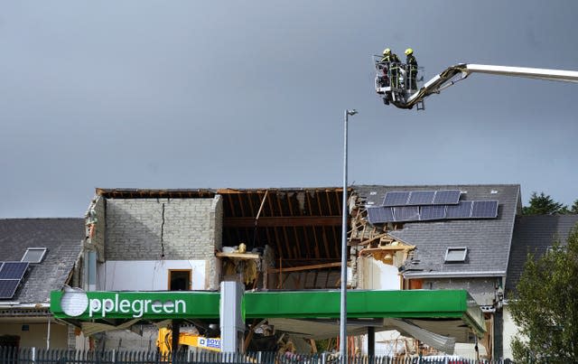 Emergency services continue their work at the scene of an explosion at the Applegreen service station