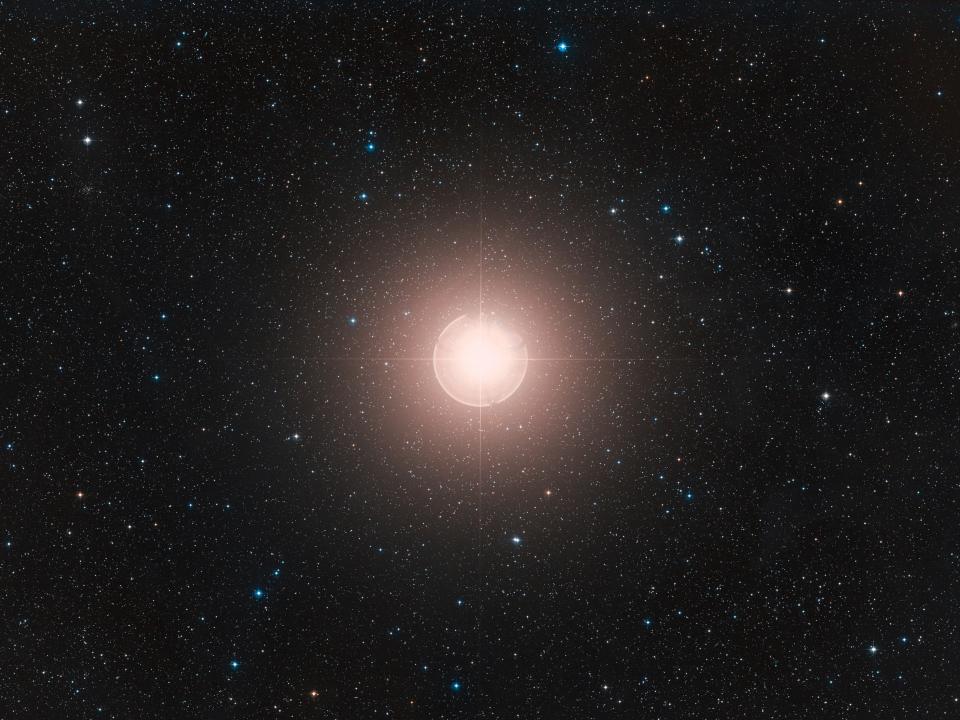 A photo of Betelgeuse taken from earth shows it shining brightly against other stars in the sky.