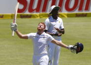 England's Jonny Bairstow celebrates scoring a century during the second cricket test match against South Africa in Cape Town, South Africa, January 3, 2016. REUTERS/Mike Hutchings