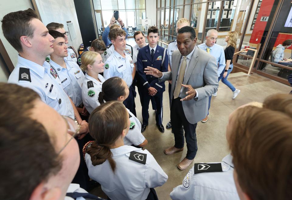 Rep. Burgess Owens, R-Utah, talks with University of Utah Air Force Junior ROTC members after speaking at the Sutherland Institute’s 2023 Congressional Series at the University of Utah Hinckley Institute in Salt Lake City on Wednesday, Aug. 30, 2023. | Jeffrey D. Allred, Deseret News