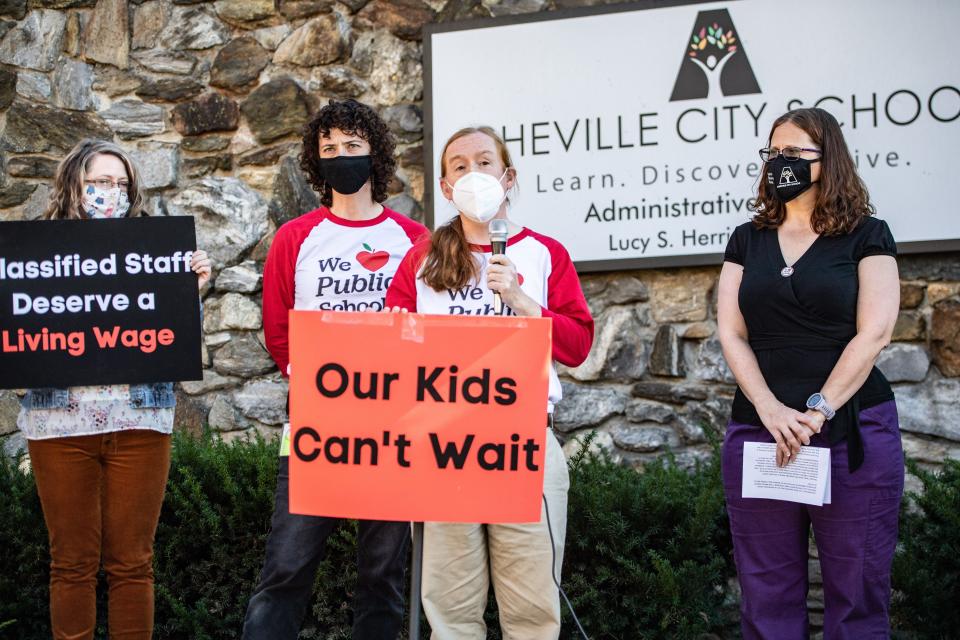 Members of the public and Asheville Association of Educators spoke at a press conference before an Asheville City Schools board meeting on November 8, 2021.