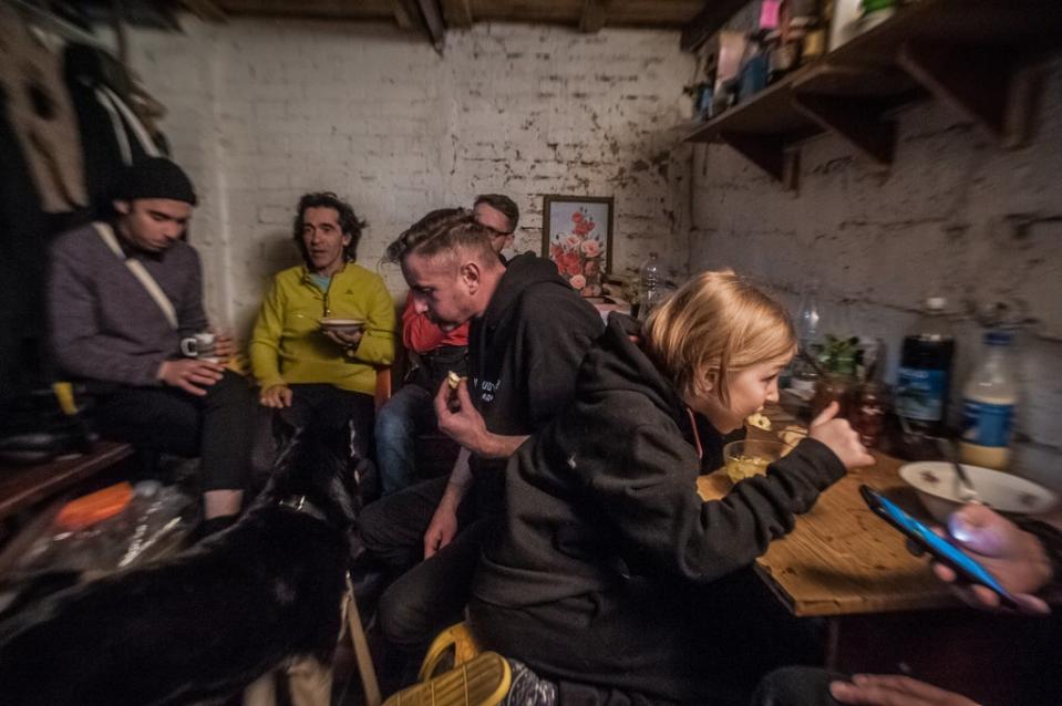 Ukrainian poet Serhiy Zhadan, actors of the Kharkiv theatre, and members of their families, have shelter in the basement of a theatre (Alina Smutko)