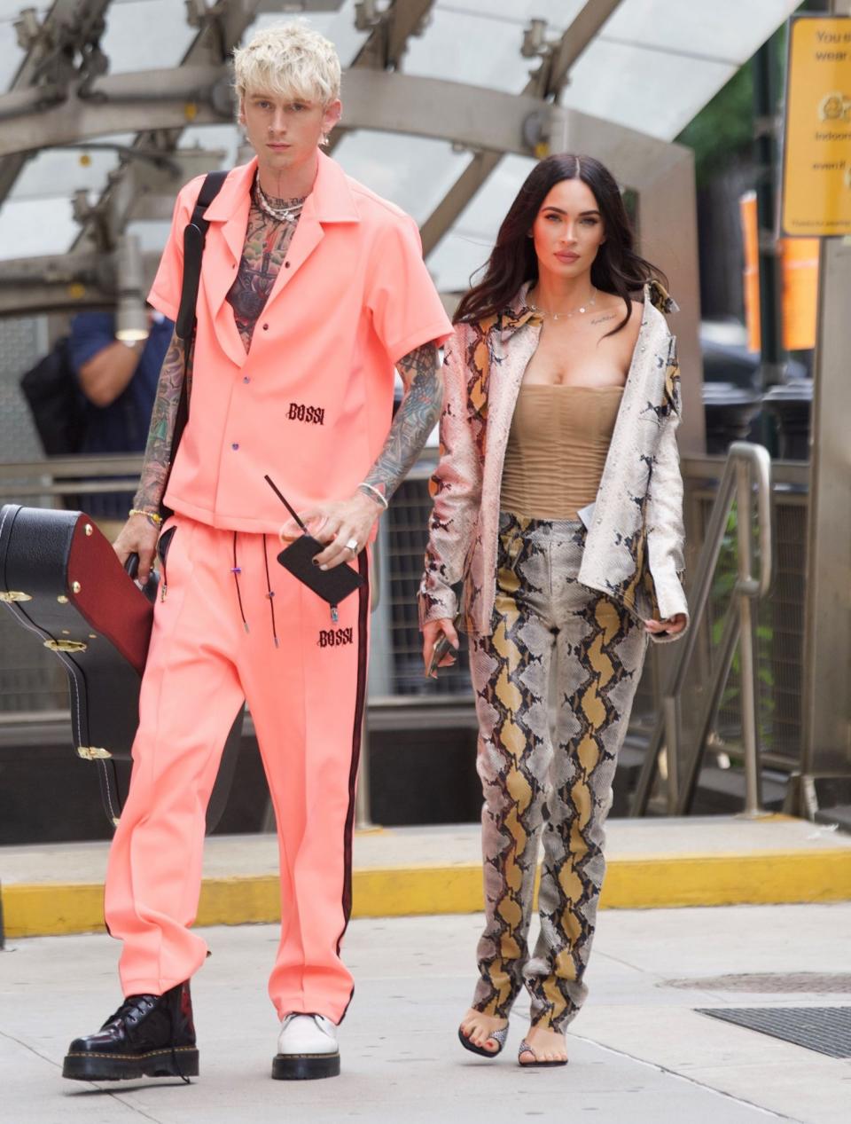 <p>Machine Gun Kelly and Megan Fox head out in N.Y.C. on Sept. 15 following his sold-out show. </p>