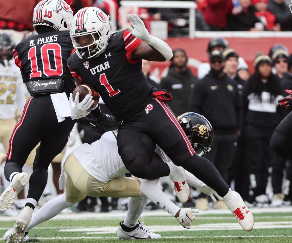 Utah Utes running back Jaylon Glover (1) runs for a big gain against the Colorado Buffaloes in Salt Lake City on Saturday, Nov. 25, 2023. Utah won 23-17. | Jeffrey D. Allred, Deseret News