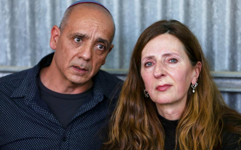 Parents of German-Israeli Shani Louk during her funeral in Srigim