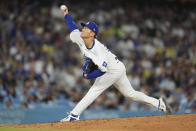 Los Angeles Dodgers pitcher Yoshinobu Yamamoto throws to a Miami Marlins batter during the fourth inning of a baseball game Tuesday, May 7, 2024, in Los Angeles. (AP Photo/Marcio Jose Sanchez)