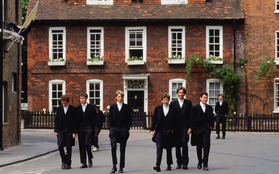 Eton schoolboys in traditional tailcoats at Eton College New & Lingwood - Tim Graham/Getty Images