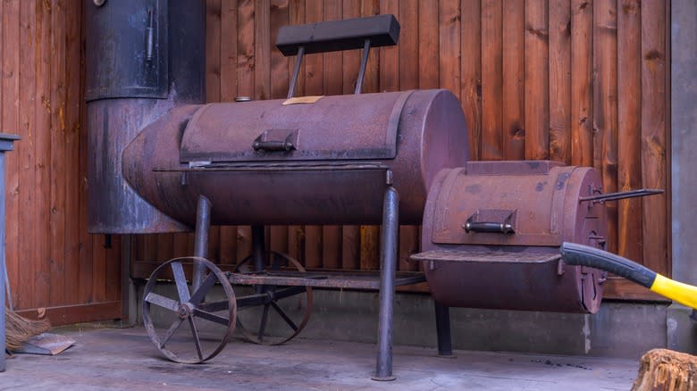 an old fashioned barrel smoker