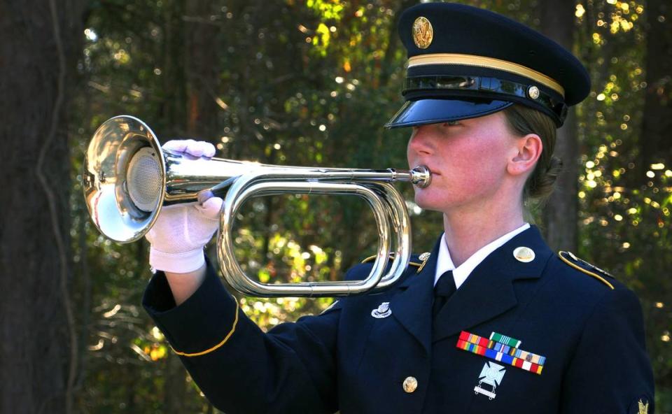 Taps is played during a funeral with military honors for Tommy Lee Harvey Jr. Thursday afternoon at Fort Mitchell National Cemetery in Alabama. Harvey died in December of 2017 and was previously  interred in a pauper grave at Porterdale Cemetery in Columbus, Georgia. 01/04/2024