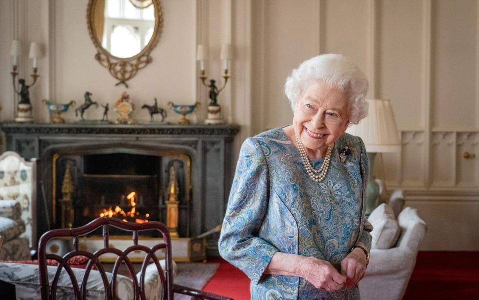 The Queen stands without her walking stick for the audience, after a week-long break on the Sandringham estate - Dominic Lipinski/AFP via Getty Images 