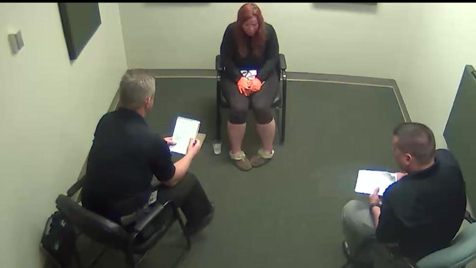 A couple of hours after that frantic 911 call, investigators interviewed Melissa Turner about the couple's drunken night. They are hard to see, but she is wearing latex gloves given to her by an officer at the scene. / Credit: Defense Attorney John Trevena