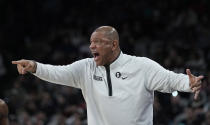 Philadelphia 76ers head coach Doc Rivers reacts to a play during the first half of an NBA basketball game against the San Antonio Spurs in San Antonio, Friday, Feb. 3, 2023. (AP Photo/Eric Gay)