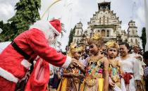 <p>Different regions of Indonesia have their own Christmas traditions. In Bali, the celebration is heavily influenced by Hinduism. Roads are decorated with yellow coconut leaves to symbolize the mythical Antaboga serpent. Their Christmas trees are also made from chicken feathers.</p>