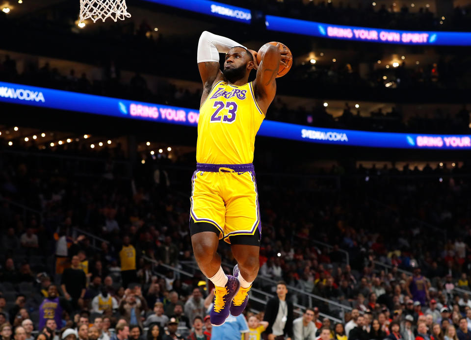 LeBron James #23 of the Los Angeles Lakers dunks against the Atlanta Hawks in the first half at State Farm Arena on December 15, 2019 in Atlanta, Georgia. - Credit: Kevin C. Cox/Getty Images
