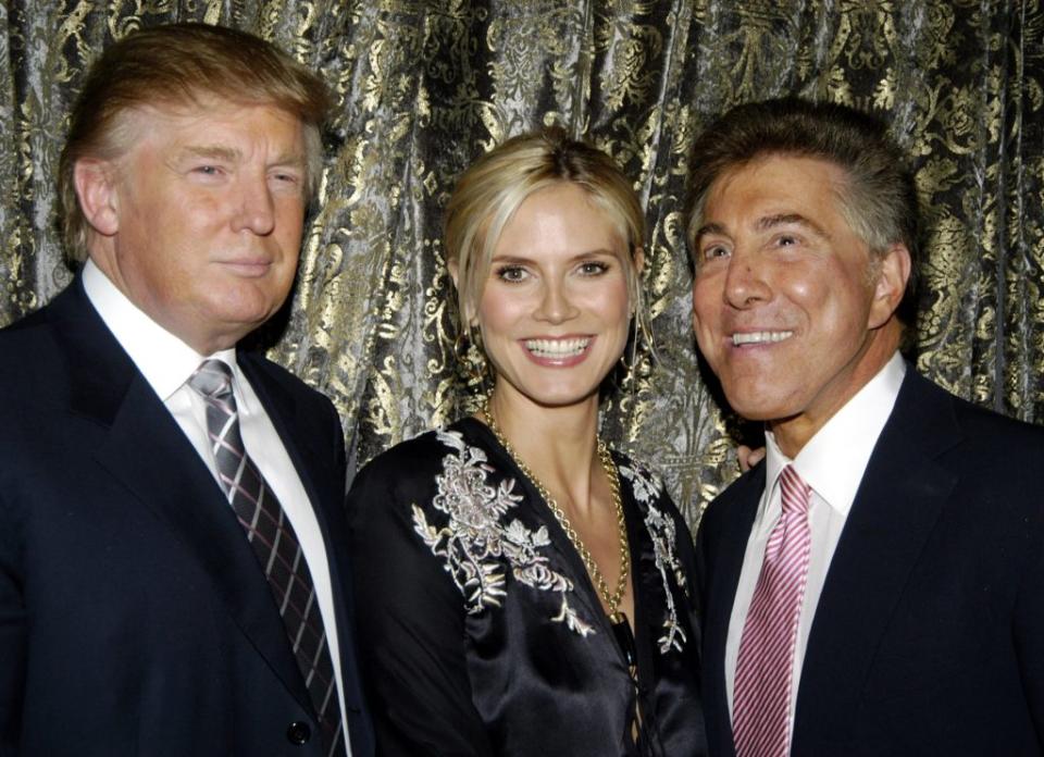 Donald Trump, Heidi Klum and Steve Wynn during The Associates Committee of The Society of Memorial Sloan-Kettering Cancer Center Host "A Wynning Hand" at Sotheby's in New York City in 2006.