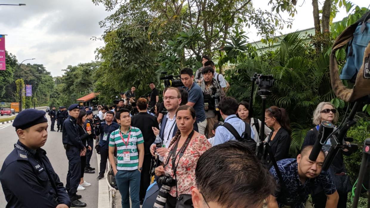 (A heated argument broke out between Ministry of Communications and Information officials and some of the assembled journalists outside Capella on 12 June, 2018. PHOTO: Wong Casandra/Yahoo News Singapore)