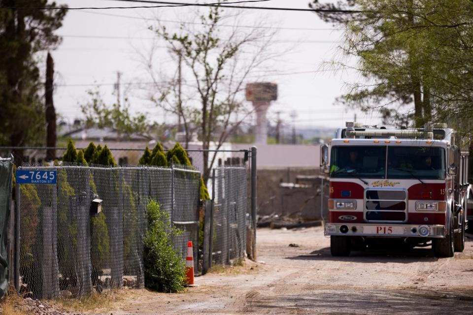 El Paso fire truck is seen on Friday morning after a fatal house fire on Thursday night, April 18, in the 7600 block of Barton Street near North Loop Drive in the Lower Valley. Two people died in the fire.