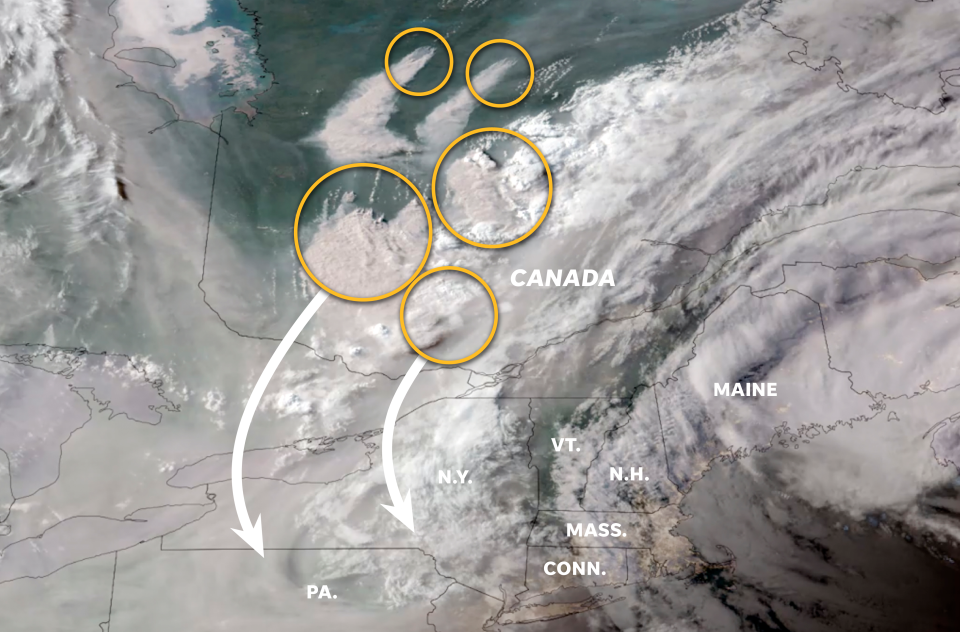 Satellite imagery shows areas of heavy smoke and wildfires burning in Quebec, Canada.