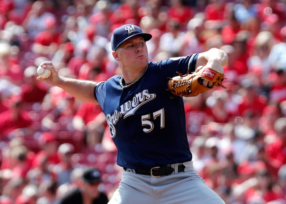 Chase Anderson pitches against the Cincinnati Reds.