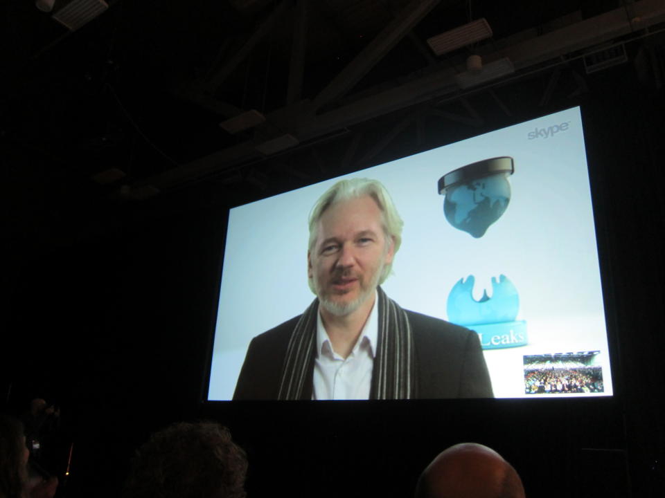 Fugitive WikLeaks founder Julian Assange speaks via Skype at the South By SouthWest Interactive festival in Austin, Texas, Saturday, March 8, 2014. Assange's appearance underscores the increasing attention that the technology industry is paying to issues of online privacy, security and surveillance. (AP Photo/Barbara Ortutay)