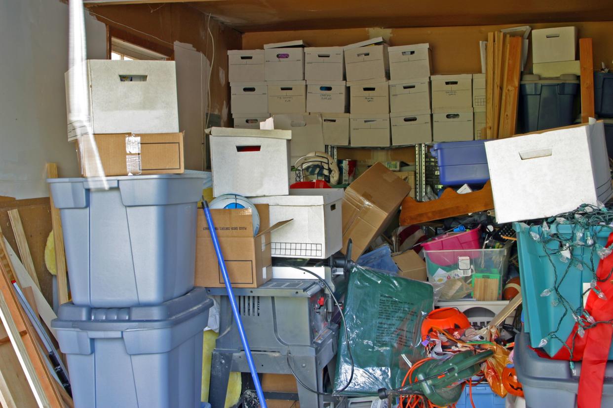 cluttered boxes in garage