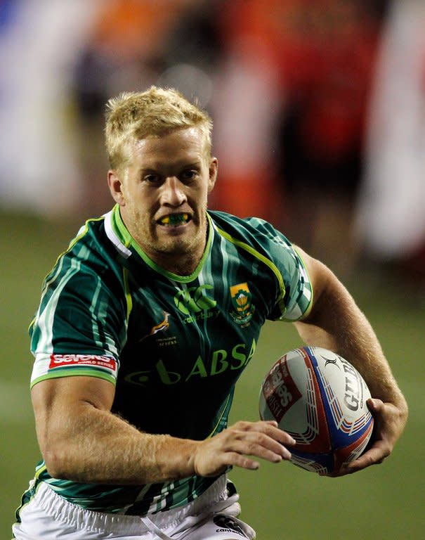 Kyle Brown of South Africa scores a try against Wales at the USA Sevens Rugby in February. After crashing out against Portugal last week, hosts South Africa want to save face at this weekend's showpiece but they will have to do so without captain Brown, who is out of action with a broken ankle