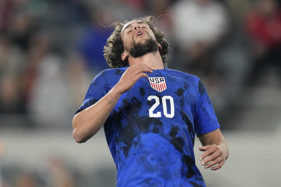 United States forward Cade Cowell (20) reacts after missing a shot during the first half of an international friendly soccer match against Serbia in Los Angeles, Wednesday, Jan. 25, 2023. (AP Photo/Ashley Landis)