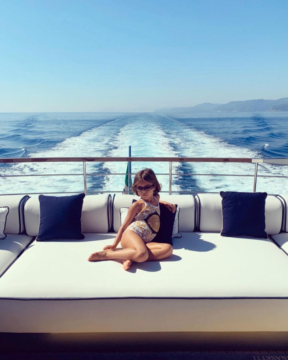 Penelope Disick poses in a Versace swimsuit
