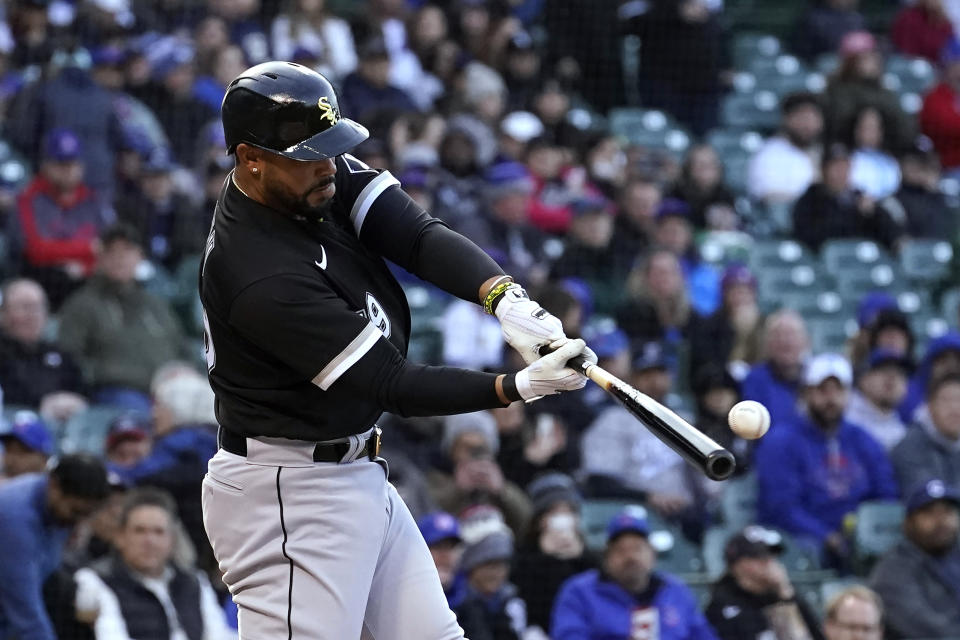 Chicago White Sox's Jose Abreu hits a home run off Chicago Cubs starting pitcher Kyle Hendricks during the first inning of a baseball game Wednesday, May 4, 2022, in Chicago. (AP Photo/Charles Rex Arbogast)