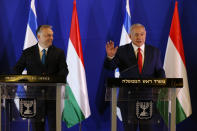 Hungarian Prime Minister Viktor Orban, left, and Israeli Prime Minister Benjamin Netanyahu attend a press conference after their meeting in Jerusalem, Tuesday, Feb. 19, 2019. (AP Photo/Ariel Schalit, Pool)