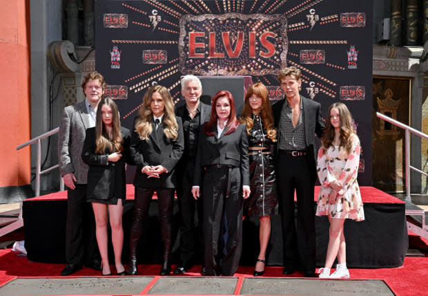 Steve Binder, Harper Vivienne Ann Lockwood, Lisa Marie Presley, Baz Luhrmann, Priscilla Presley, Riley Keough, Austin Butler and Finley Aaron Love Lockwood attend the Handprint Ceremony honoring Three Generations of Presley's at TCL Chinese Theatre on June 21, 2022, in Hollywood.<p><a href="https://www.gettyimages.com/detail/1404295931" rel="nofollow noopener" target="_blank" data-ylk="slk:Axelle/Bauer-Griffin/Getty Images;elm:context_link;itc:0;sec:content-canvas" class="link ">Axelle/Bauer-Griffin/Getty Images</a></p>