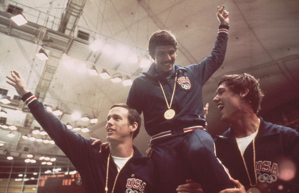 UNSPECIFIED - August 26: Swimming: 1972 Summer Olympics, United States Mark Spitz is carried off the field by his teammates after winning the gold medal in the relay race, Munich, Germany, August 26, 1972 - September 11, 1972 (Photo by Heinz Kluetmeier/Sports Illustrated via Getty Images) (Set Number: X17073)