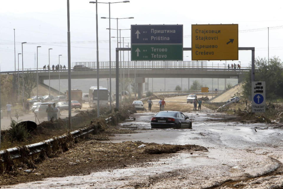 <p>Macedonia hit by torrential rain and flooding</p><p>Abandoned vehicles are pictured on a motorway, after flooding caused by an overnight storm near the village of Stajkovci, just east of Skopje, Macedonia, Sunday, Aug. 7, 2016. (AP Photo/Boris Grdanoski)</p>