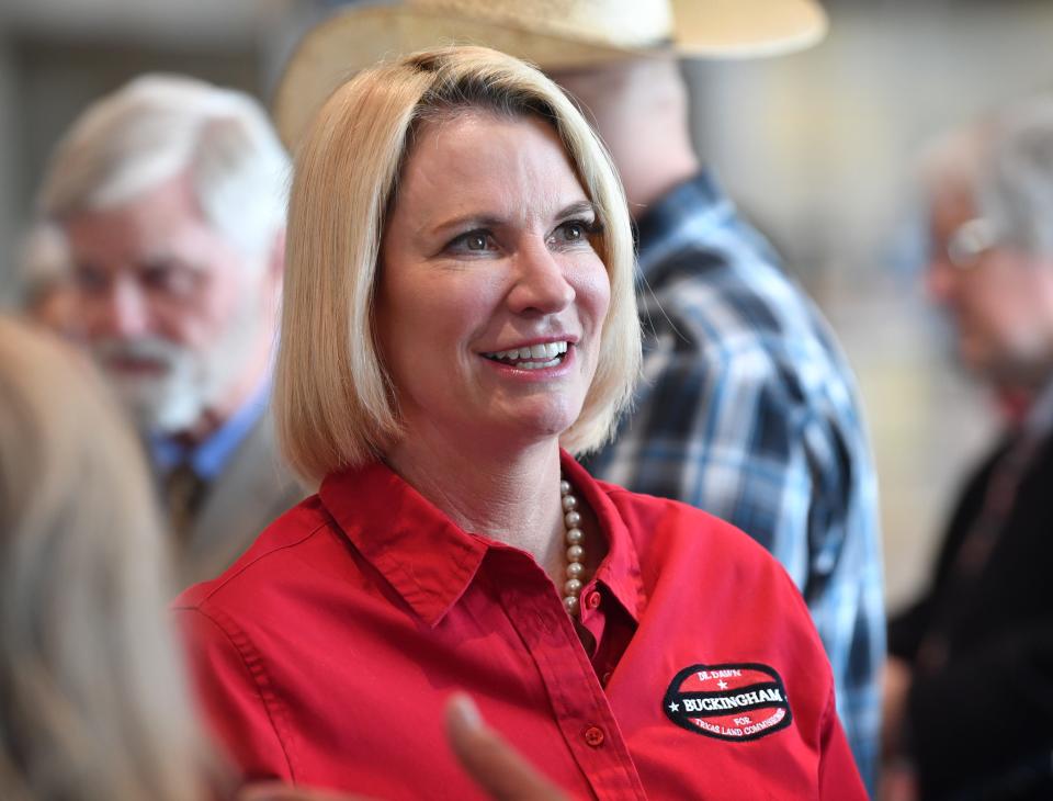 Dawn Buckingham visits with supporters during a stop at the Wichita Falls Regional Airport in May in her campaign for Texas land commissioner.