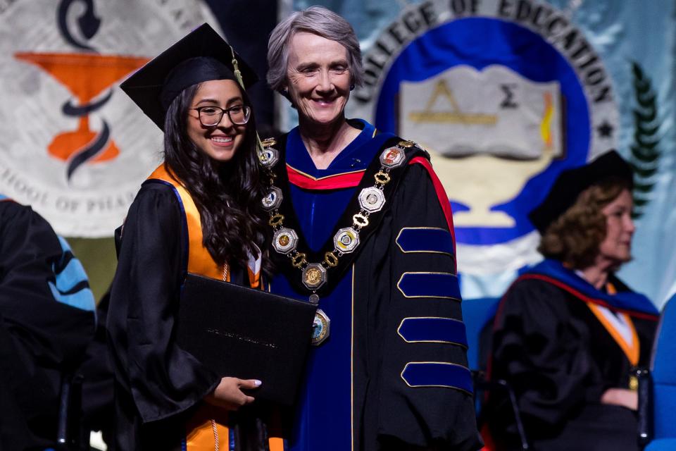 UTEP President Heather Wilson, right, at the 2023 spring commencement ceremonies at the Don Haskins Center on the UTEP campus.