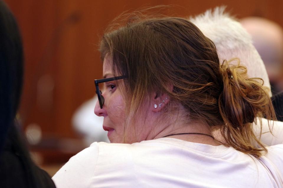 Anastasia Grantsis, sister of shooting victim Greg Grantsis of Brockton, sits with other family and friends during the trial of Shamallah Jones in Plymouth Superior Court on Tuesday, Jan. 30, 2024.