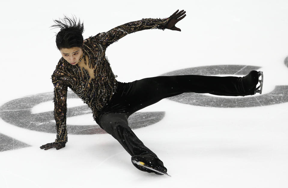 Yuzuru Hanyu of Japan falls as he performs in the men's free skating during the ISU Grand Prix of Figure Skating Rostelecom Cup in Moscow, Russia, Saturday, Nov. 17, 2018. (AP Photo/Alexander Zemlianichenko)